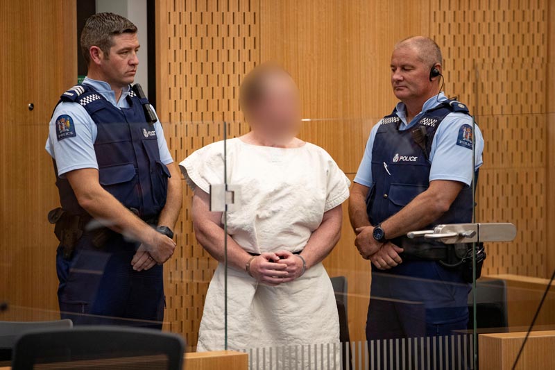 FILE: Brenton Tarrant, charged for murder in relation to the mosque attacks, is seen in the dock during his appearance in the Christchurch District Court, New Zealand March 16, 2019. Photo: Mark Mitchell/New Zealand Herald/Pool via Reuters/file