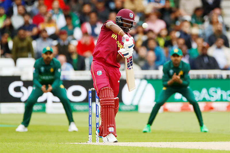 West Indies' Darren Bravo is dismissed after being caught out by Pakistan's Babar Azam off the bowling of Mohammad Amir. Photo: Reuters