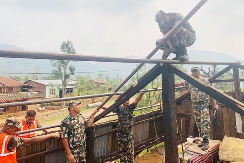 Nepali Army personnel reconstructing houses destroyed by a windstorm in East Nawalparasi, on Wednesday, May 29, 2019. Photo: THT