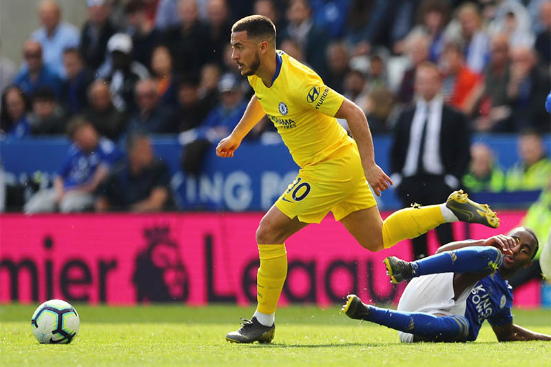 Chelsea's Eden Hazard in action with Leicester City's Ricardo Pereira. Photo: Reuters