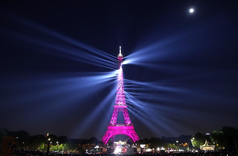 A light show illuminates the Eiffel Tower for its 130 year anniversary, in Paris, Wednesday, May 15, 2019. Photo: AP