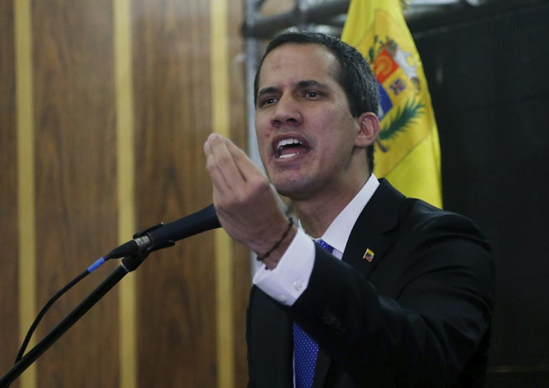 Venezuela's opposition leader and self-proclaimed interim president Juan Guaidu00f3 speaks during a meeting with the  Chamber of Commerce, in Caracas, Venezuela, Thursday, May 16, 2019. Photo: AP