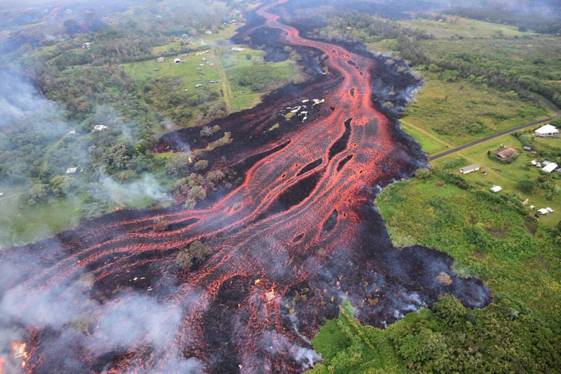 Lava flows from fissures near Pahoa, Hawaii, Saturday, May 19, 2018. Photo: US Geological Survey via AP/File