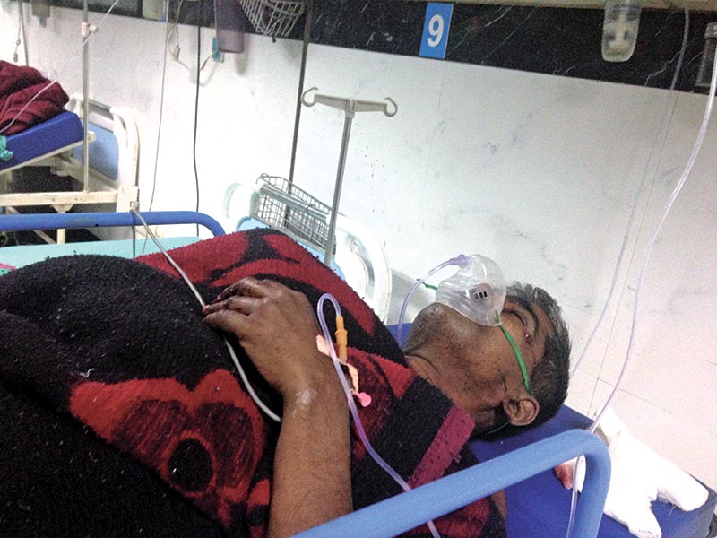 A person, who was injured in a bomb blast on Sunday evening, receiving treatment at a hospital, in Kathmandu, on Monday. Photo: THT