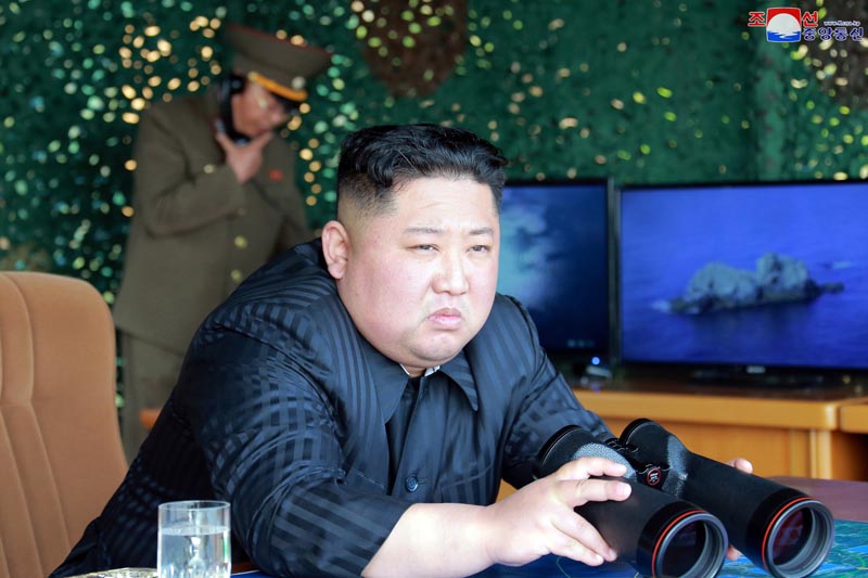 This Saturday, May 4, 2019, photo provided on Sunday, May 5, 2019, by the North Korean government shows North Korean leader Kim Jong Un, equipped with binoculars, observing tests of different weapons systems, in North Korea. Photo: Korean Central News Agency/Korea News Service via AP