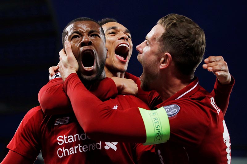 Liverpool's Georginio Wijnaldum celebrates scoring their third goal with Jordan Henderson and Trent Alexander-Arnold during the Champions League Semi Final Second Leg match between Liverpool and FC Barcelona, at Anfield, in  Liverpool, Britain, on May 7, 2019. Photo: Reuters