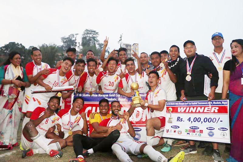 Nepal APF Club players and officials celebrate after winning the 14th Martyr Bhim Narayan Gold Cup at the local Tundikhel grounds in Kathmandu on Friday, May 17, 2019. Photo: THT