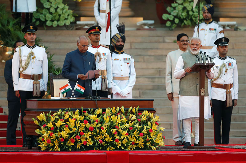 India's President Ram Nath Kovind administers oath of India's Prime Minister Narendra Modi during a swearing-in ceremony at the presidential palace in New Delhi, India May 30, 2019. Photo: Reuters
