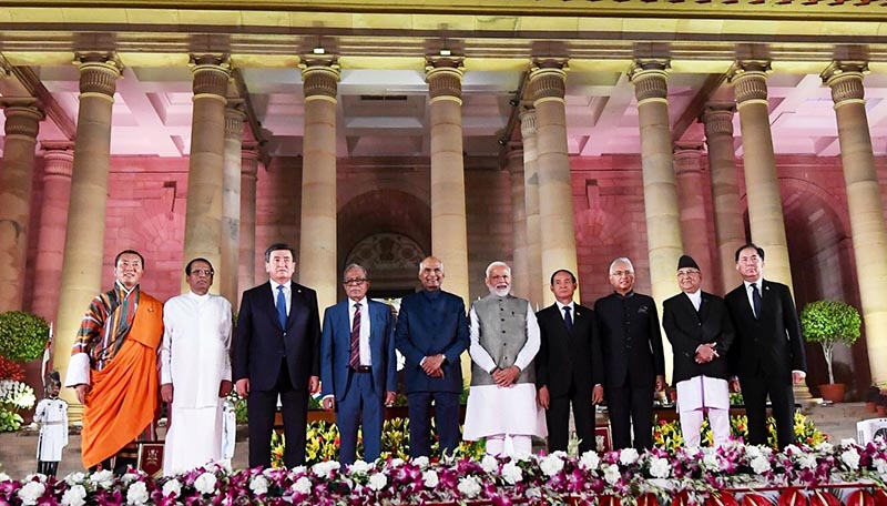 Indian Prime Minister Narendra Modi with leaders of BIMSTEC member nations, President of Kyrgyz Republic  SCO Chair and Pravasi Bharatiya PM of Mauritius, Prime Minister of Nepal KP Sharma Oli among others, after being sworn in as Prime Minister, in New Delhi, India, on Thursday, May 30, 2019. Photo: MEAIndia Twitter