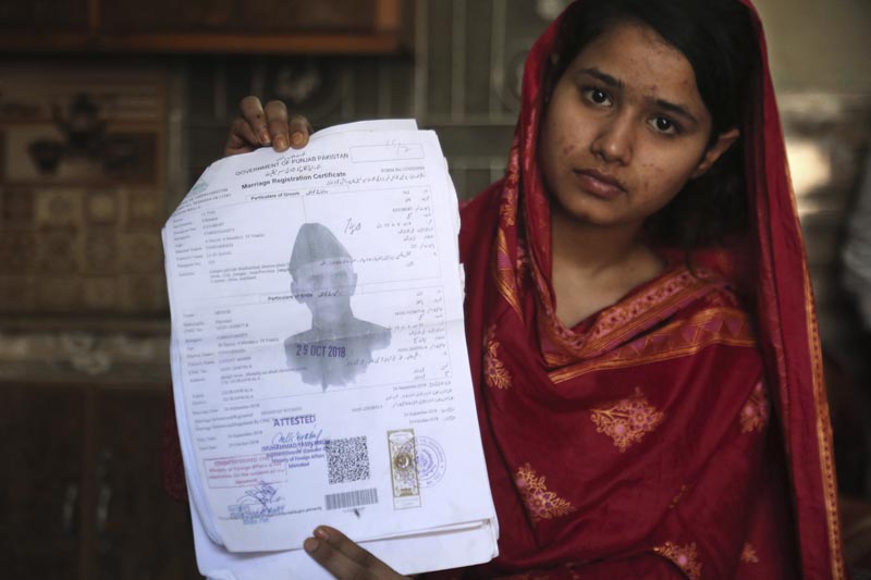 Mahek Liaqat, who married a Chinese national, shows her marriage certificate in Gujranwala, Pakistan as taken in April 14, 2019. Photo: AP