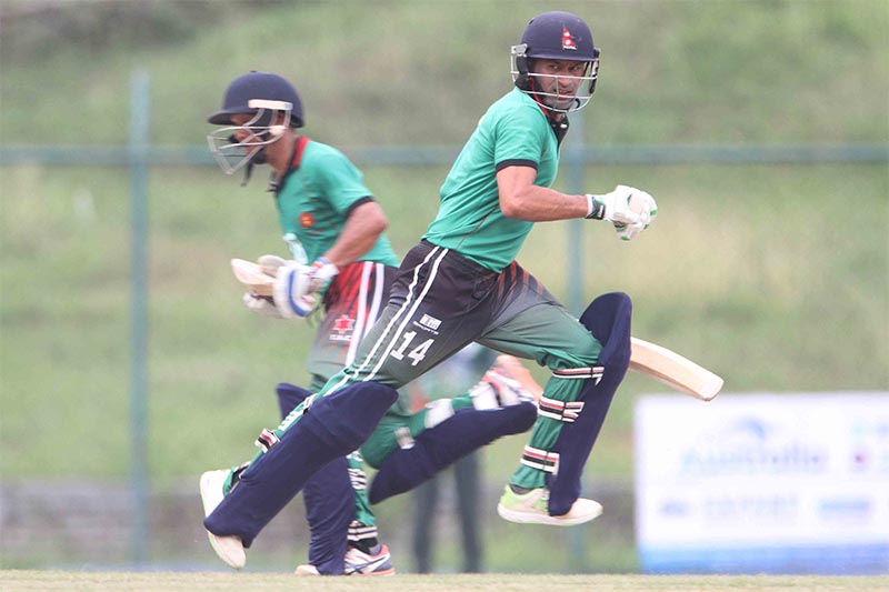 TAC skipper Binod Bhandari (right) and Raju Rijal run between the wickets during their Prime Minister Cup One Day Cricket Tournament match against Province-2 at the TU Stadium in Kathmandu on Friday, May 24, 2019. Photo: Udipt Singh Chhetry