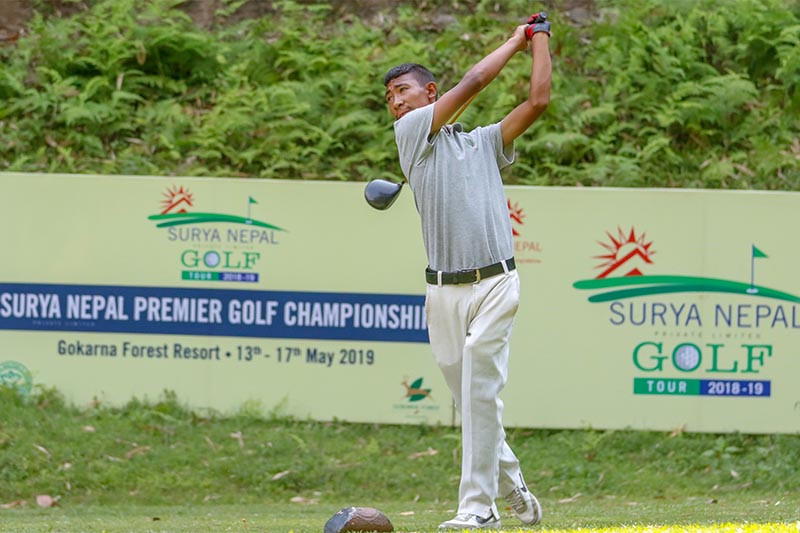 Subash Tamang plays a shot during the second round of the Surya Nepal Premier Golf Championship at the Gokarna Golf Club in Kathmandu on Tuesday, May 14, 2019. Photo: THT