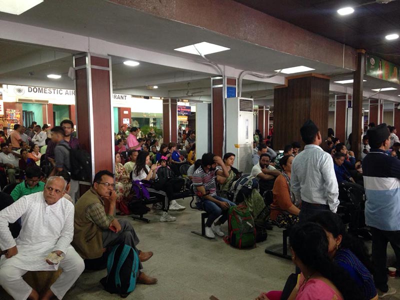 Passengers waiting at the domestic terminal of Tribhuvan International Airport for their flights to resume, in Kathmandu, on May 30, 2019. Photo: THT Online