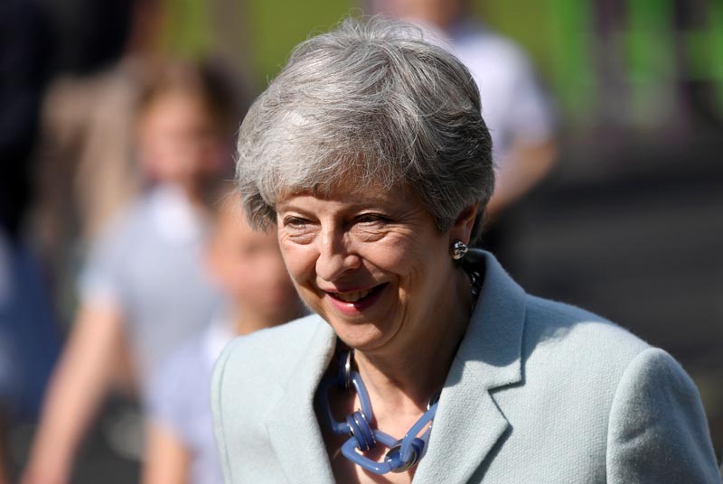 Britain's Prime Minister Theresa May arrives to vote in the European Parliament Elections, taking place despite Brexit uncertainty, in Sonning, Britain, May 23, 2019. Photo: Reuters
