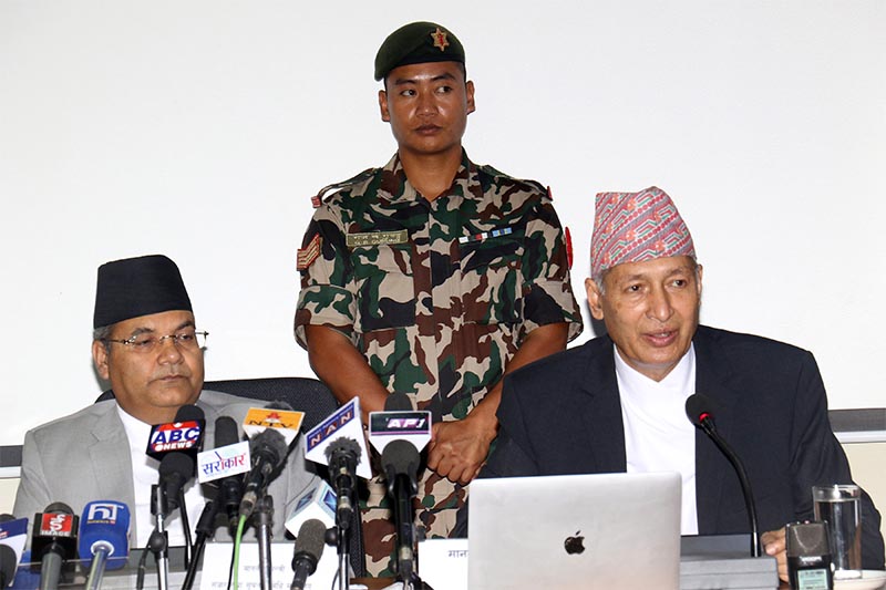 Minister of Finance Yubaraj Khatiwada and Minister of Information and Communications Gokul Prasad Baskota (left) at a post-budget interaction with journalists held at the Ministry of Finance in Kathmandu, on Thursday, May 30, 2019. Photo: RSS