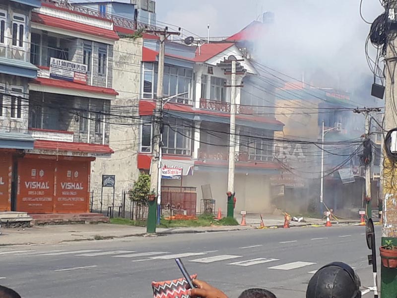 Flames and smoke arising as bomb disposal team of Nepal Army disposed a pressure cooker bomb in Srijana Chowk of Pokhara Metropolitan City- 8, on Monday, May 27, 2019. Photo: Rishi Ram Baral/ THT
