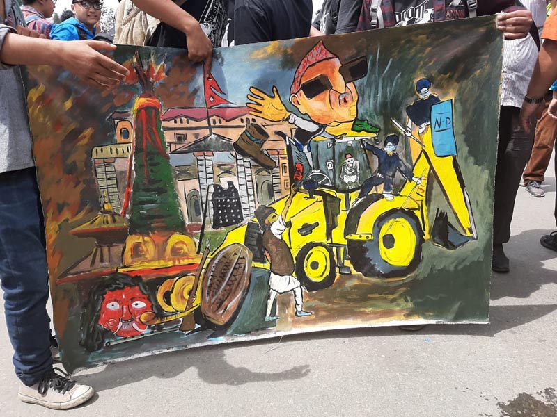 Protesters carry satirical poster at the protest against the Guthi Bill, in Kathmandu, on Wednesday, June 19, 2019. Photo: Nishant Pokhrel/THT Online