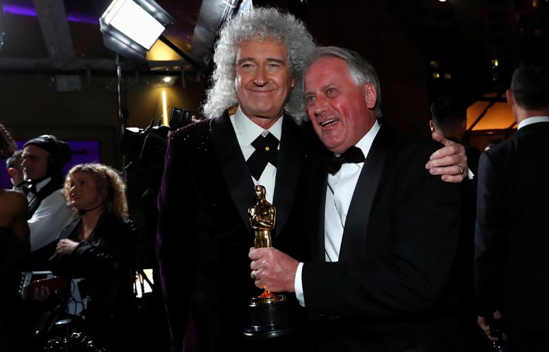 File: Brian May of Queen reacts with Paul Massey, winner of Achievement in sound mixing during 91st Academy Awards - Oscars Governors Ball, at Hollywood, in Los Angeles, California, US, on February 24, 2019. Photo: Reuters
