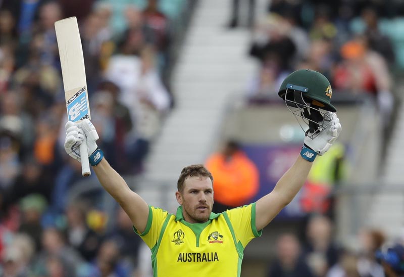 Australia's captain Aaron Finch celebrates scoring a century during the World Cup cricket match between Sri Lanka and Australia at The Oval in London, Saturday, June 15, 2019. Photo: AP