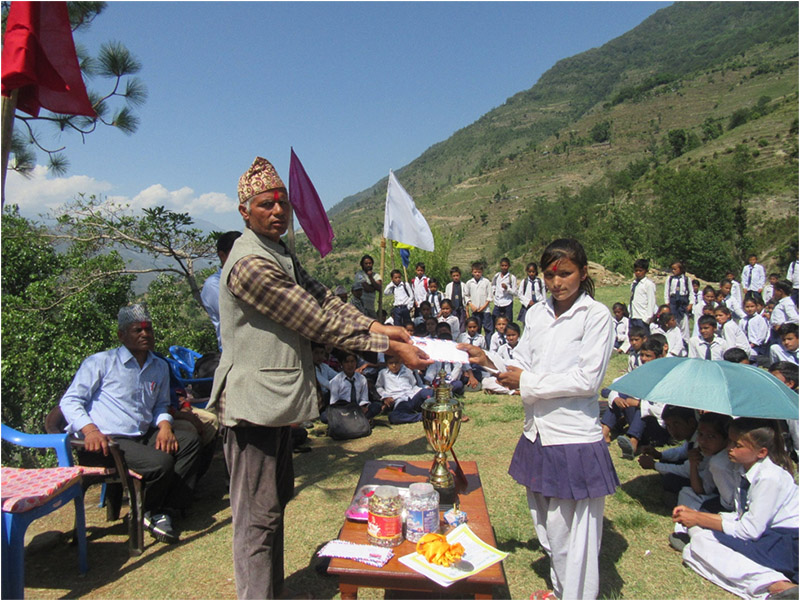 Scholarships being handed over to students in Triveni Municipality, Bajura district. Photo: Prakash Singh/THT
