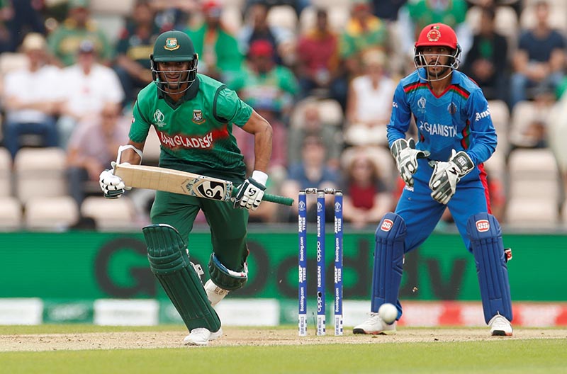 Bangladesh's Shakib Al Hasan in action as Afghanistan's Ikram Alikhil looks on during the ICC Cricket World Cup match between Bangladesh and Afghanistan, at The Ageas Bowl, in Southampton, Britain, on June 24, 2019. Photo: Action Images via Reuters