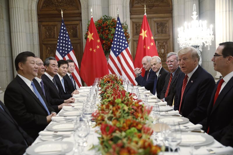 US President Donald Trump, second right, meets with China's President Xi Jinping, left, during their bilateral meeting at the G20 Summit, in Buenos Aires, Argentina, December 1, 2018. Photo: AP/File)
