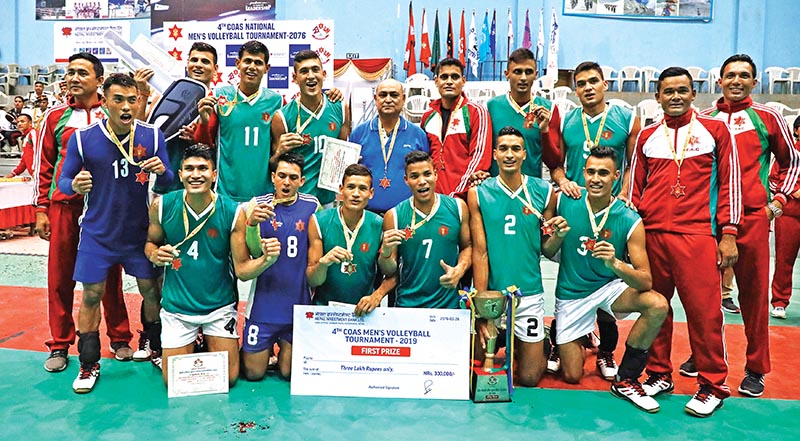 Players and officials of Tribhuvan Army Club celebrate after winning the fourth CoAS Men’s National Volleyball Tournament at the Nepali Army Sports Complex in Lalitpur on Monday. Photo: THT