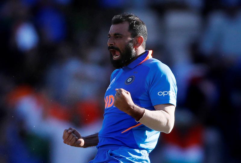 India's Mohammed Shami celebrates taking the wicket of Afghanistan's Mujeeb Ur Rahman to complete a hat trick and win the match during the ICC Cricket World Cup match between India and Afghanistan, at The Ageas Bowl, in Southampton, Britain, on June 22, 2019. Photo: Action Images via Reuters