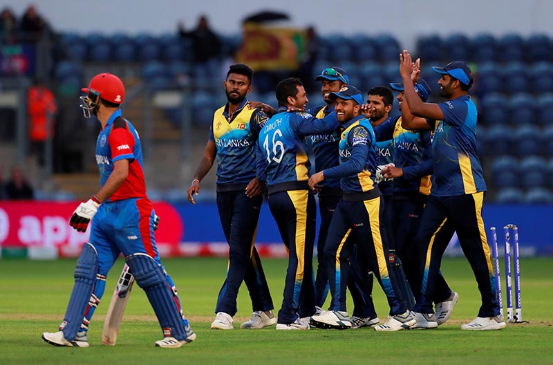 Sri Lanka players celebrate after Afghanistan's Najibullah Zadran is run out during the ICC Cricket World Cup match between Afghanistan and Sri Lanka, at Cardiff Wales Stadium, in Cardiff, Britain, on June 4, 2019. Photo: Action Images via Reuters