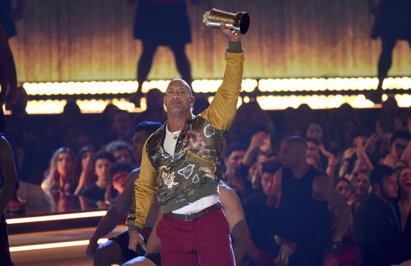 Dwayne Johnson, also known as The Rock, accepts the generation award at the MTV Movie and TV Awards on Saturday, June 15, 2019, at the Barker Hangar in Santa Monica, California. Photo: Chris Pizzello/Invision/AP
