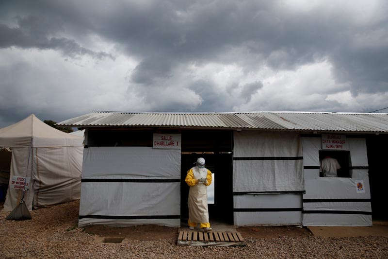 FILE PHOTO: A health worker wearing Ebola protection gear, leaves the dressing room before entering the Biosecure Emergency Care Unit (CUBE) at the ALIMA (The Alliance for International Medical Action) Ebola treatment centre in Beni, in the Democratic Republic of Congo, March 30, 2019. Photo: Reuters