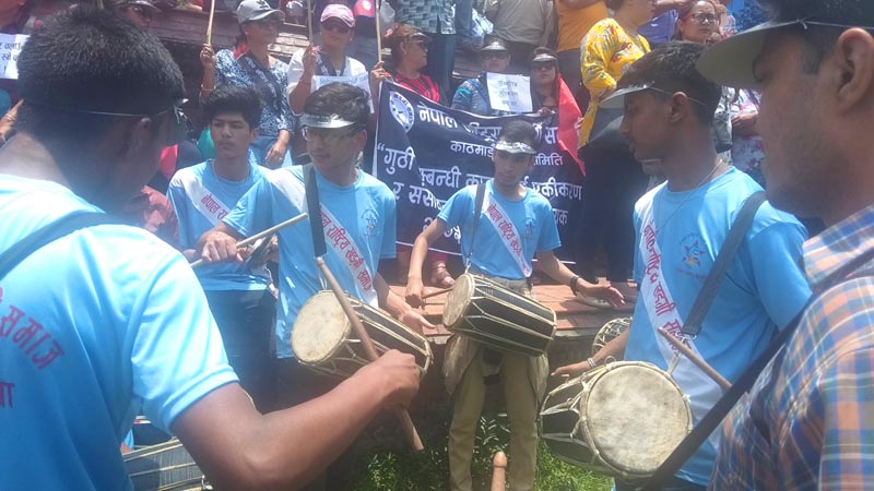A group of Newar youths playing traditional instruments as a sign of protest against the Guthi Bill, in Maitighar Mandala, Kathmandu, on Wednesday, June 19, 2019. Photo courtesy: Jenisha Mainali