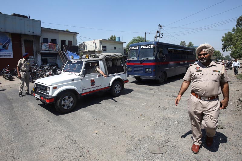 A police bus carrying the men accused of rape and murder of an eight-year-old girl in Kathua, near Jammu, arrives at a court in Pathankot, in the northern state of Punjab, India June 10, 2019. Photo: Reuters