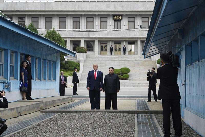 President Donald Trump meets with North Korean leader Kim Jong Un at the border village of Panmunjom in the Demilitarized Zone, South Korea, Sunday, June 30, 2019. Photo: AP