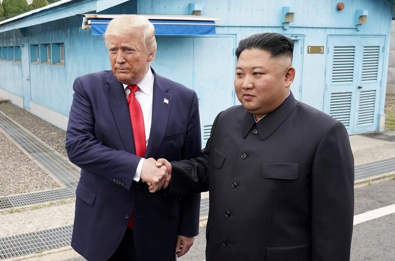 US President Donald Trump meets with North Korean leader Kim Jong Un at the demilitarized zone separating the two Koreas, in Panmunjom, South Korea, June 30, 2019. Photo: Reuters