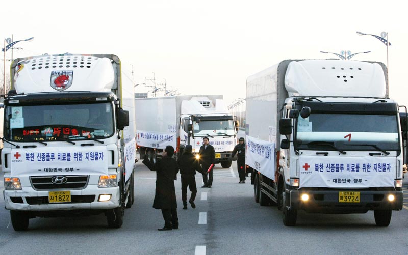 FILE: In this December 18, 2009, file photo, South Korean trucks transporting the Influenza medicine Tamiflu and Relenza get ready to leave for North Korean city of Kaesong as South Korean Army soldiers stand at customs, immigration and quarantine office in Paju, near the border village of the Panmunjom (DMZ) that separates the two Koreas since the Korean War, South Korea.South Korea is scrambling to prevent the spread of the highly contagious African swine fever on its pig herds after North Korea confirmed an outbreak at a farm near its border with China. Photo: AP/file