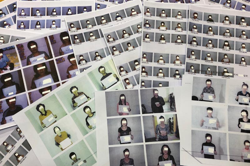 Photo sheets of the North Korean refugees helped by the North Korea Refugees Human Rights Association of Korea are displayed in Seoul, South Korea, June 11, 2019. Photo: Reuters