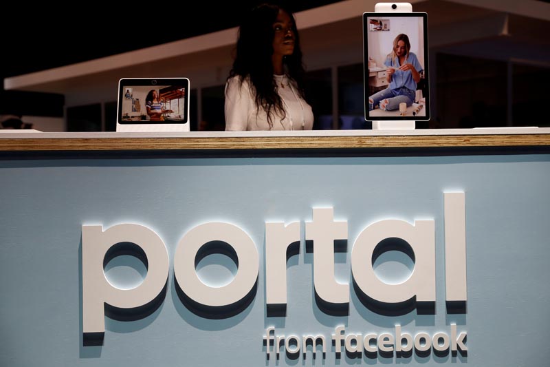 FILE PHOTO: A worker stands behind a Portal booth during Facebook Inc's F8 developers conference in San Jose, California, US, April 30, 2019. Photo: Reuters