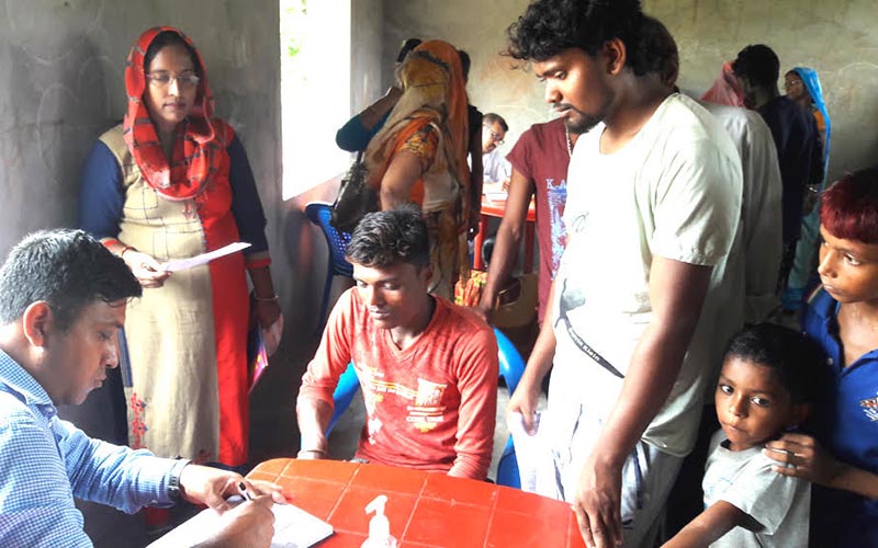 Patients suffering from skin diseases being treated at a free health camp organised in Rajbiraj Municipality, Saptari, on Thursday. Photo: THT