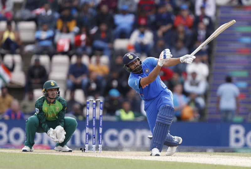India's Rohit Sharma plays a shot off the bowling of South Africa's Tabraiz Shamsi during their Cricket World Cup match between South Africa and India at the Hampshire Bowl in Southampton, England, Wednesday, June 5, 2019. Photo: AP