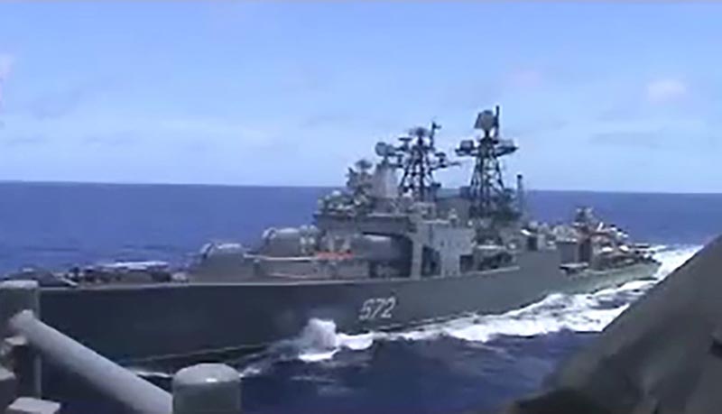 A screen grab from video shows the Russian naval destroyer Udaloy making what the US Navy describes as an unsafe maneuver against the Ticonderoga-class guided-missile cruiser USS Chancellorsville in the Philippine Sea, on June 7, 2019.  Photo: US Navy/Handout via Reuters