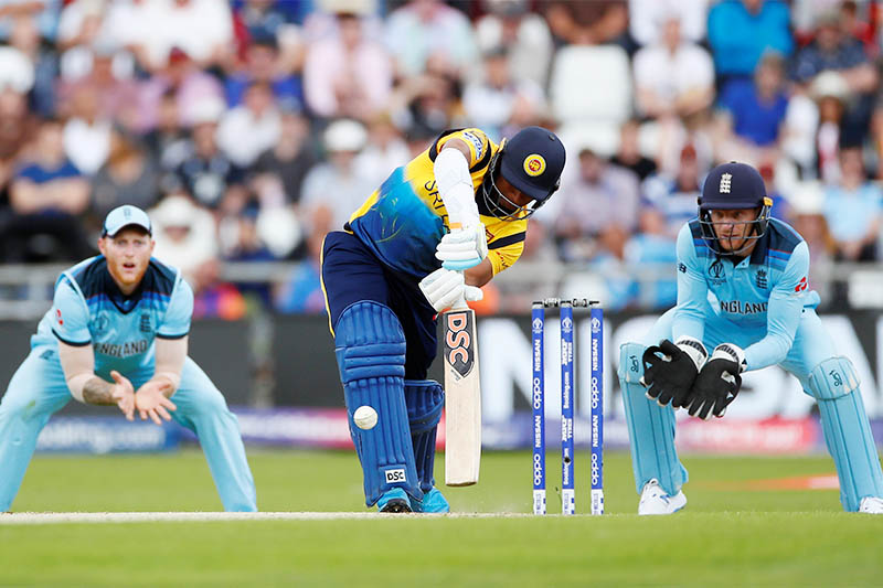 Sri Lanka's Jeevan Mendis in action as he was caught and bowled by England's Adil Rashid. Photo: Reuters