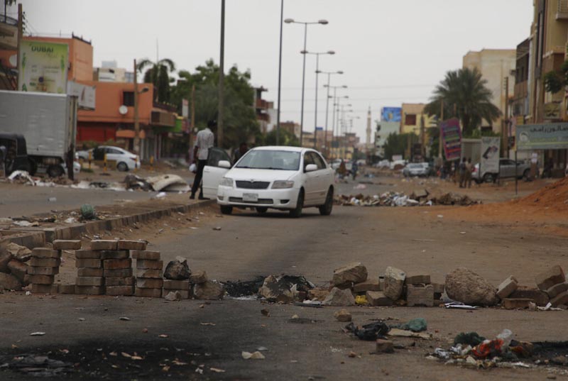 Bricks laid by protesters to block a main street in the Sudanese capital Khartoum to stop military vehicles from driving through the area on Wednesday, June 5, 2019. Photo: AP