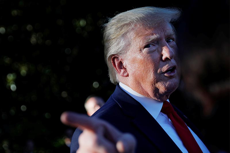US President Donald Trump talks to reporters during the annual Congressional picnic event at the South Lawn of the White House in Washington, US, on June 21, 2019. Photo: Reuters