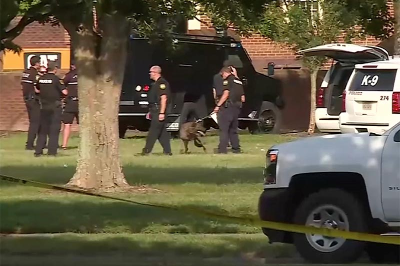 A police canine unit stands by in this still image taken from video following a shooting incident at the municipal center in Virginia Beach, Virginia, US, on May 31, 2019.  Photo: WAVY-TV/NBC/via Reuters