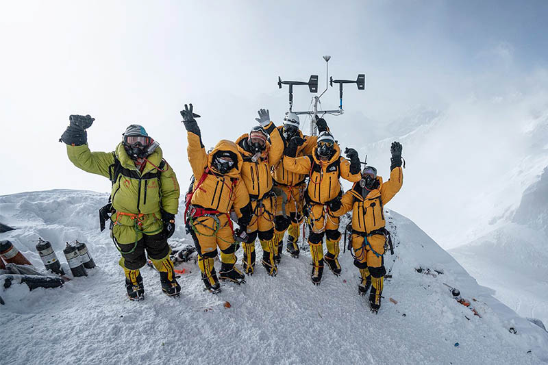 Members of the multidisciplinary team pose for a portrait after successfully installing weather stations on Mt Everest. Courtesy: NatGeo Society