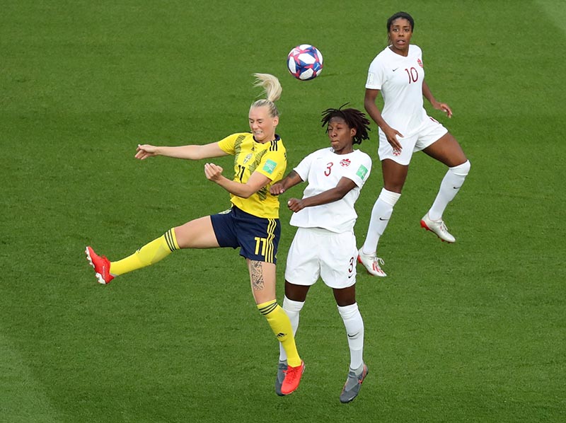Sweden's Stina Blackstenius in action with Canada's Kadeisha Buchanan during the Women's World Cup Round of 16 match between Sweden and Canada, at Parc des Princes, in Paris, France, on June 24, 2019. Photo: Reuters