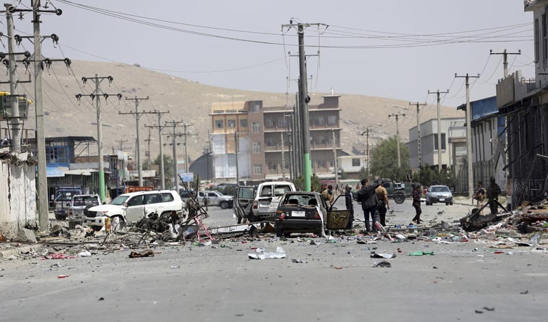 Afghan security personnel inspect at the site of a suicide attack in Kabul, Afghanistan, Thursday, July 25, 2019. Photo: AP