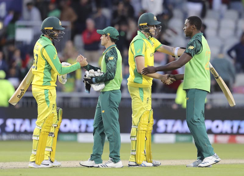 Australian and South African players shake hands at the end of the Cricket World Cup match between Australia and South Africa at Old Trafford in Manchester, England, Saturday, July 6, 2019. Photo: AP