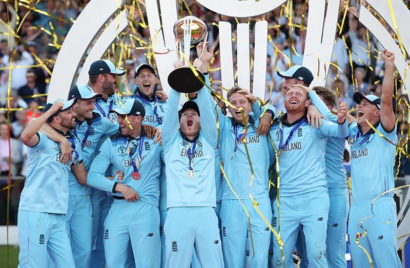 England's Eoin Morgan and teammates celebrate winning the world cup with the trophy, at Lord's, London, Britain, at July 14, 2019. Photo: Action Images via Reuters